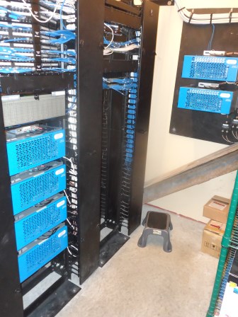 Server rack with blue and black equipment.